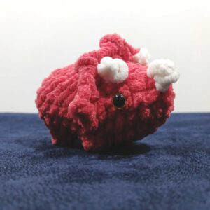 Gehaakte triceratops – verschillende kleuren